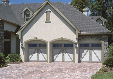 modern white garage door with windows