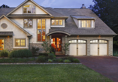 modern white coachman garage door with windows