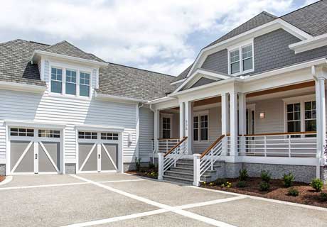 gray coachman garage doors with windows