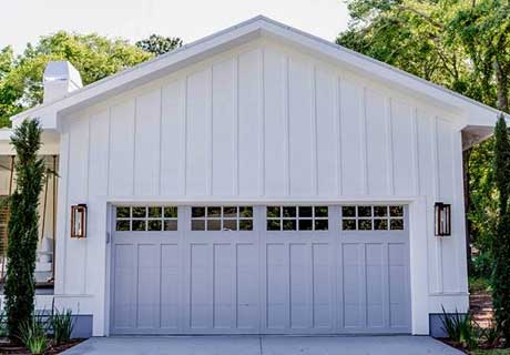 gray coachman garage door with windows