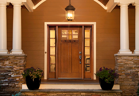 entryway with wooden door